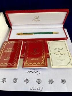 Stylo à bille Cartier rare, finition en or malachite, boîte et certificat, neuf de stock ancien.